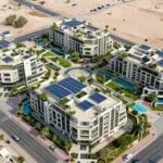 Aerial view of green communities in Dubai showing sustainable architecture and lush landscapes